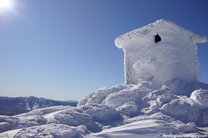 Avery Peak summit building with Sugarloaf in the background (January 2010)