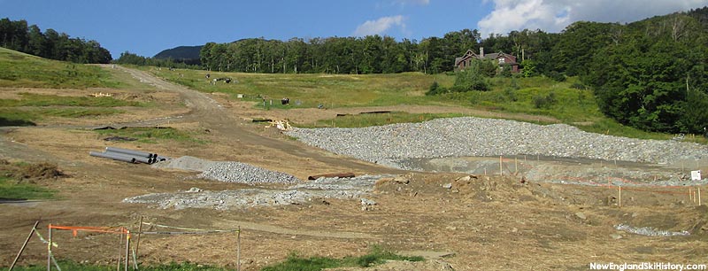 Excavation of the bottom terminal location (right) and tower footings (left) (September 2014)