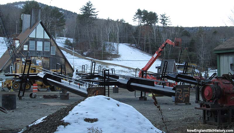 Triple chairlift towers in the parking lot awaiting installation (November 2014)